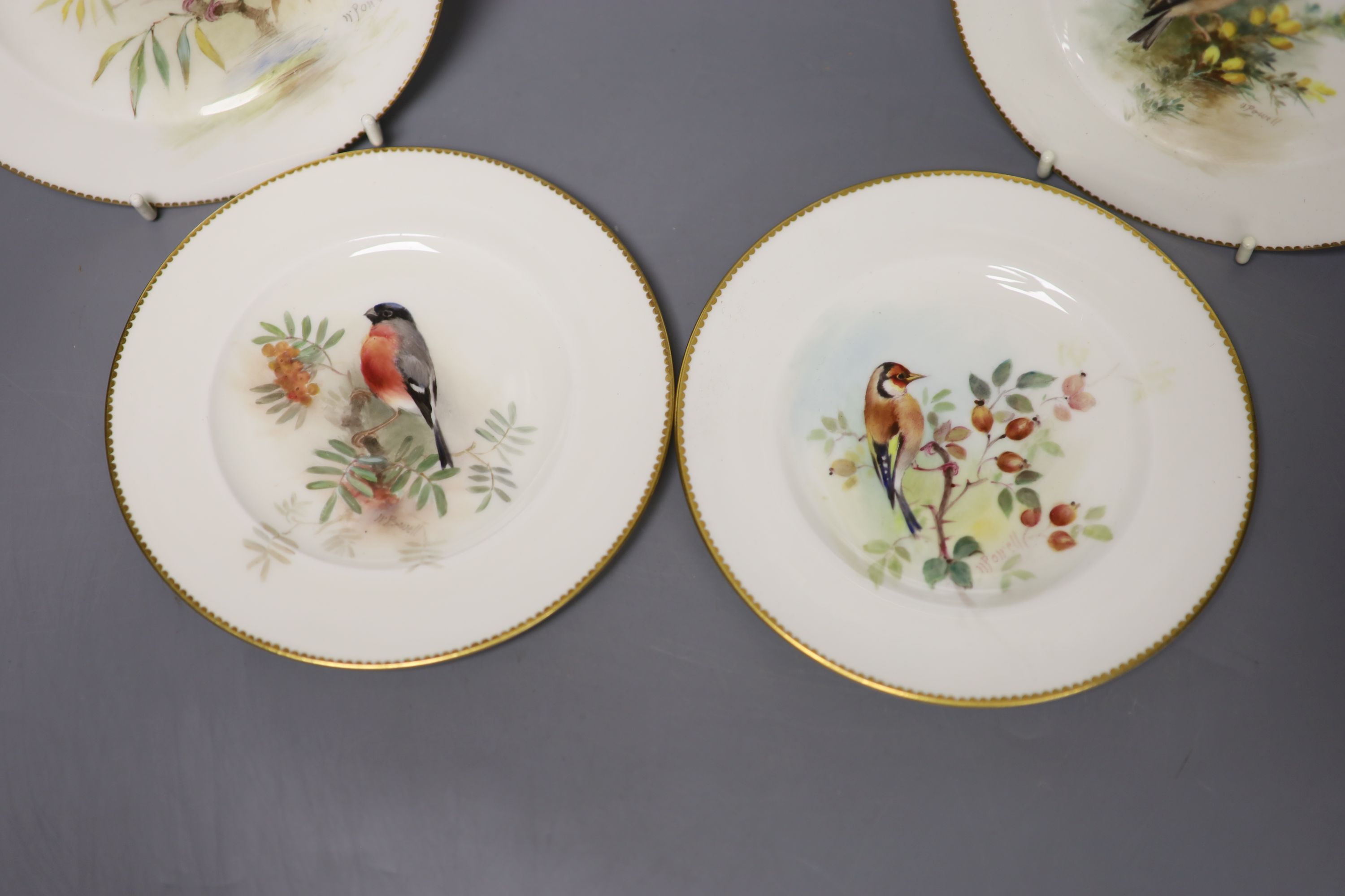 A set of four Royal Worcester plates, painted with Bullfinch, Kingfisher, Goldfinch and another interpretation of Goldfinch, all signed